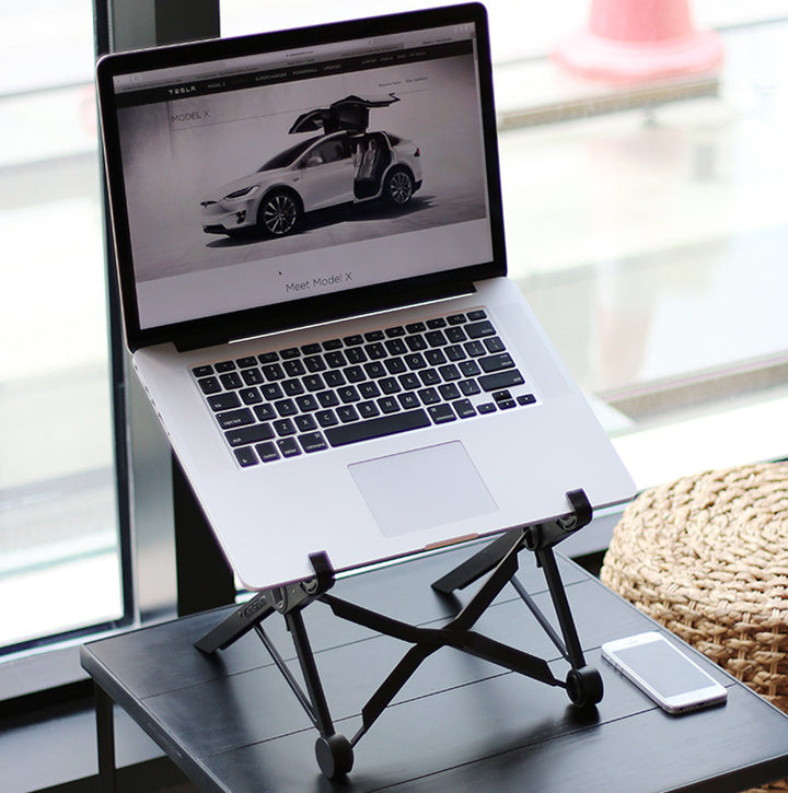 Folding portable lifting laptop stand